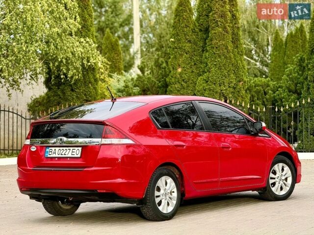 Червоний Хонда Інсайт, об'ємом двигуна 1.4 л та пробігом 209 тис. км за 8600 $, фото 7 на Automoto.ua