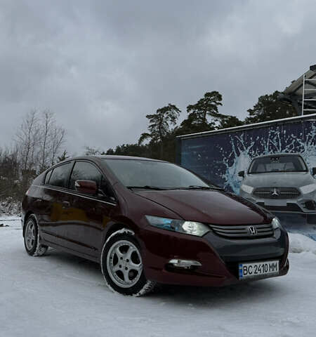 Красный Хонда Инсайт, объемом двигателя 1.34 л и пробегом 229 тыс. км за 6900 $, фото 2 на Automoto.ua