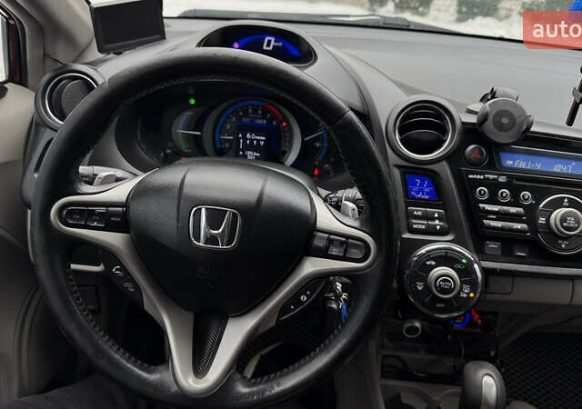 Красный Хонда Инсайт, объемом двигателя 1.34 л и пробегом 229 тыс. км за 6900 $, фото 13 на Automoto.ua