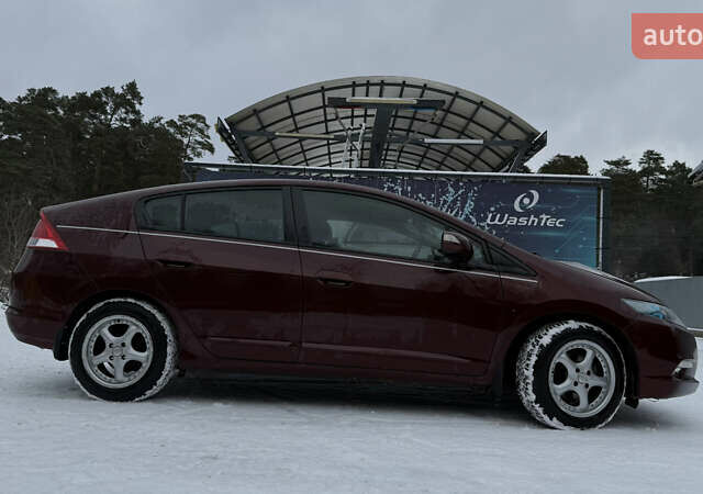 Красный Хонда Инсайт, объемом двигателя 1.34 л и пробегом 229 тыс. км за 6900 $, фото 3 на Automoto.ua