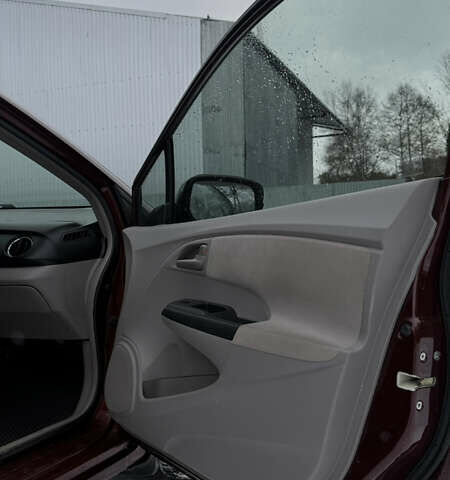 Красный Хонда Инсайт, объемом двигателя 1.34 л и пробегом 229 тыс. км за 6900 $, фото 17 на Automoto.ua