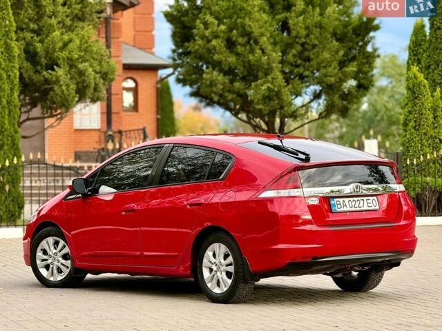 Червоний Хонда Інсайт, об'ємом двигуна 1.4 л та пробігом 209 тис. км за 8600 $, фото 4 на Automoto.ua