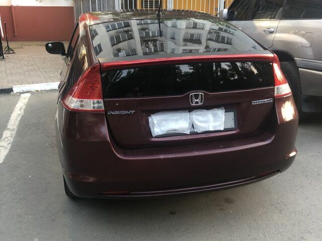 Червоний Хонда Інсайт, об'ємом двигуна 1.3 л та пробігом 208 тис. км за 4300 $, фото 7 на Automoto.ua