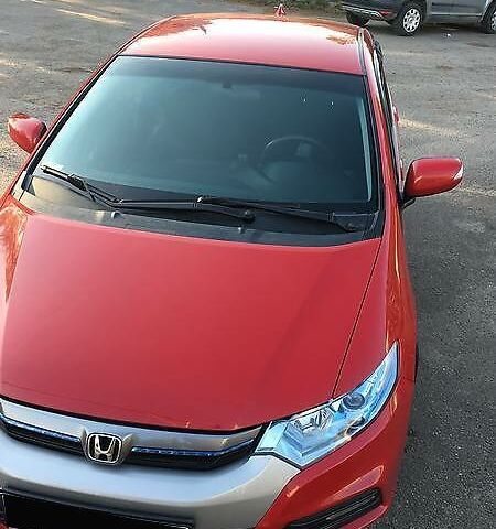 Красный Хонда Инсайт, объемом двигателя 1.3 л и пробегом 126 тыс. км за 9500 $, фото 5 на Automoto.ua
