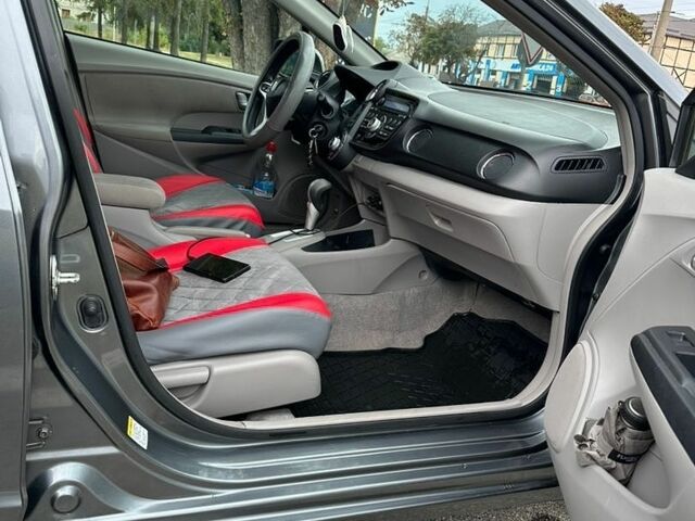 Хонда Инсайт, объемом двигателя 1.3 л и пробегом 177 тыс. км за 7100 $, фото 4 на Automoto.ua