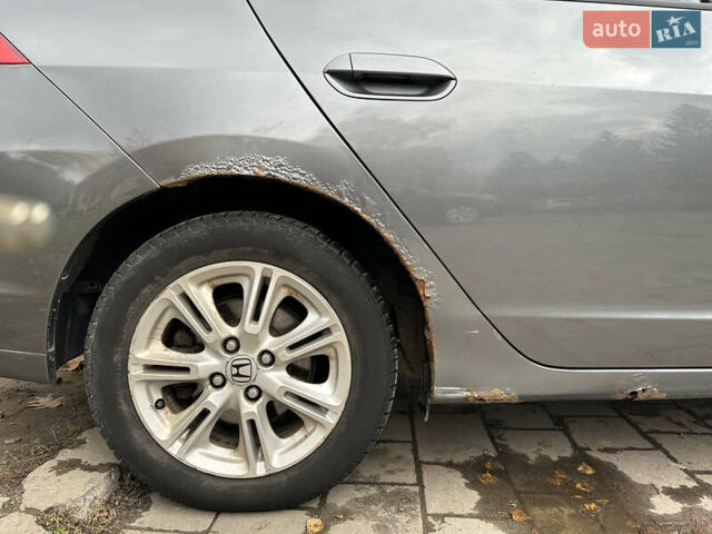 Серый Хонда Инсайт, объемом двигателя 1.34 л и пробегом 205 тыс. км за 5800 $, фото 6 на Automoto.ua