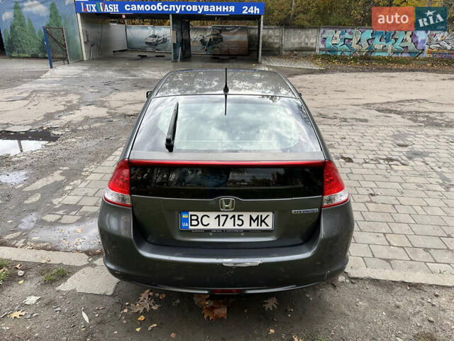 Серый Хонда Инсайт, объемом двигателя 1.34 л и пробегом 205 тыс. км за 5800 $, фото 9 на Automoto.ua