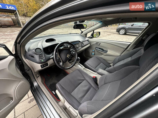 Серый Хонда Инсайт, объемом двигателя 1.34 л и пробегом 205 тыс. км за 5800 $, фото 21 на Automoto.ua