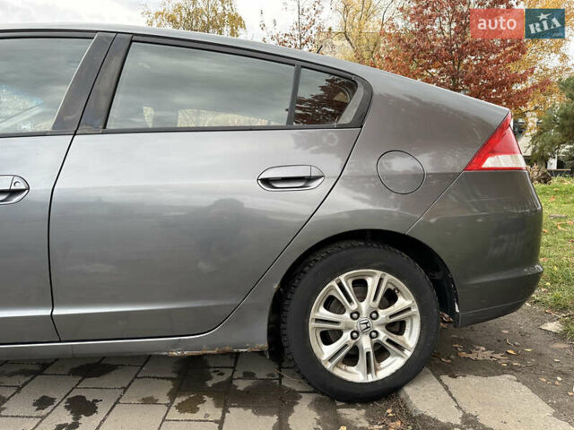 Серый Хонда Инсайт, объемом двигателя 1.34 л и пробегом 205 тыс. км за 5800 $, фото 12 на Automoto.ua