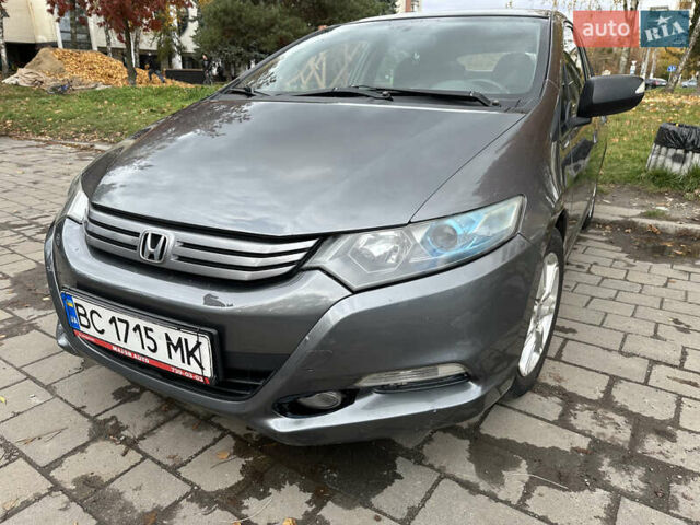 Серый Хонда Инсайт, объемом двигателя 1.34 л и пробегом 205 тыс. км за 5800 $, фото 16 на Automoto.ua