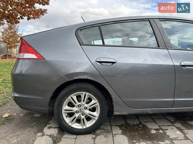 Серый Хонда Инсайт, объемом двигателя 1.34 л и пробегом 205 тыс. км за 5800 $, фото 7 на Automoto.ua