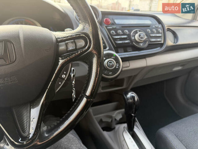 Серый Хонда Инсайт, объемом двигателя 1.34 л и пробегом 305 тыс. км за 5600 $, фото 12 на Automoto.ua