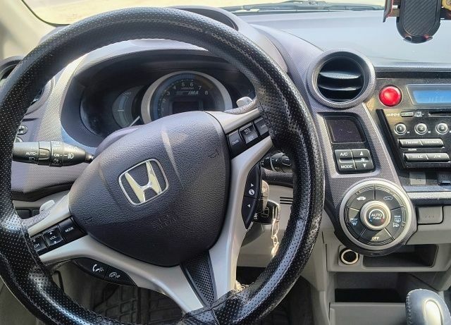 Сірий Хонда Інсайт, об'ємом двигуна 1.3 л та пробігом 233 тис. км за 6298 $, фото 7 на Automoto.ua