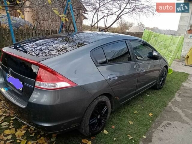 Серый Хонда Инсайт, объемом двигателя 1.3 л и пробегом 229 тыс. км за 7500 $, фото 27 на Automoto.ua