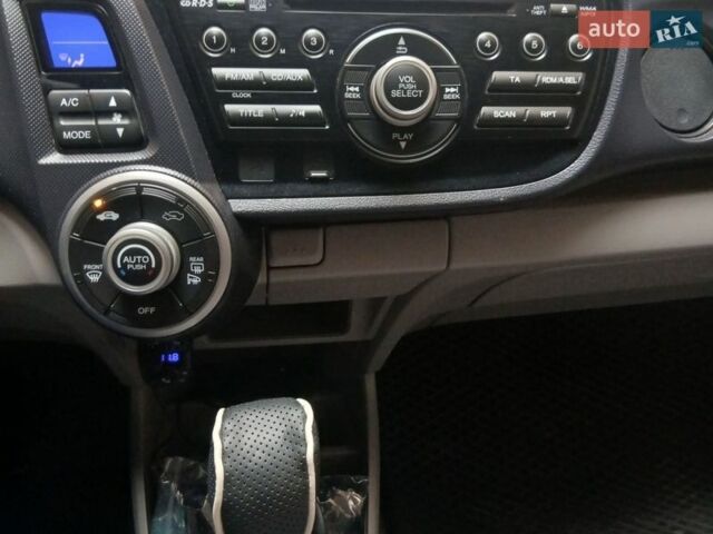 Серый Хонда Инсайт, объемом двигателя 1.3 л и пробегом 229 тыс. км за 7500 $, фото 1 на Automoto.ua