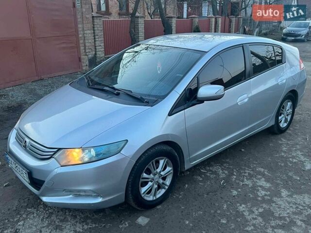 Серый Хонда Инсайт, объемом двигателя 1.34 л и пробегом 295 тыс. км за 6000 $, фото 14 на Automoto.ua
