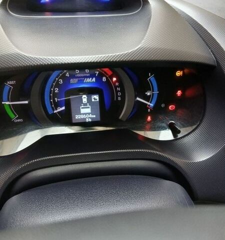 Серый Хонда Инсайт, объемом двигателя 1.3 л и пробегом 229 тыс. км за 7500 $, фото 4 на Automoto.ua