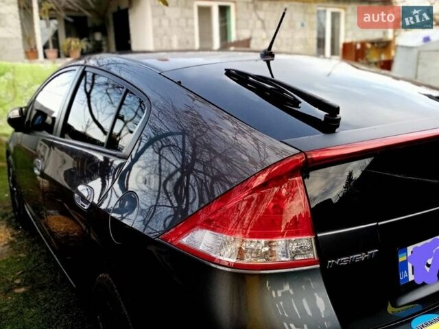 Серый Хонда Инсайт, объемом двигателя 1.3 л и пробегом 229 тыс. км за 7500 $, фото 26 на Automoto.ua