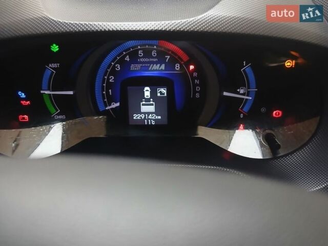 Серый Хонда Инсайт, объемом двигателя 1.3 л и пробегом 229 тыс. км за 7500 $, фото 2 на Automoto.ua