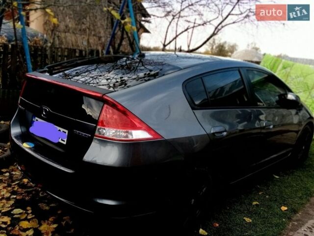 Серый Хонда Инсайт, объемом двигателя 1.3 л и пробегом 229 тыс. км за 7500 $, фото 24 на Automoto.ua