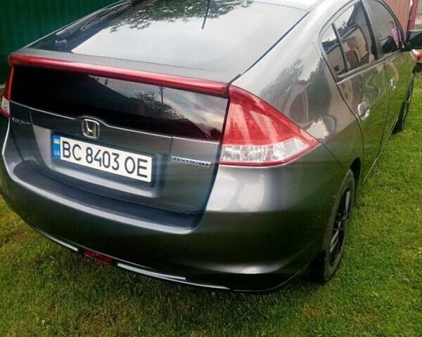 Серый Хонда Инсайт, объемом двигателя 1.34 л и пробегом 228 тыс. км за 8000 $, фото 2 на Automoto.ua