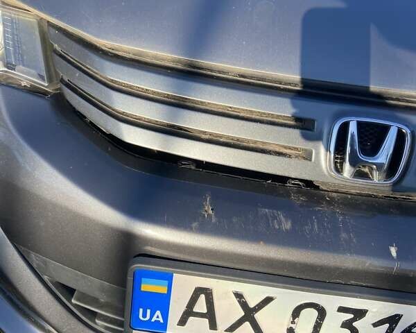Серый Хонда Инсайт, объемом двигателя 1.34 л и пробегом 317 тыс. км за 5800 $, фото 17 на Automoto.ua