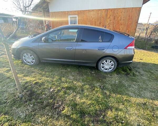 Серый Хонда Инсайт, объемом двигателя 1.34 л и пробегом 317 тыс. км за 5800 $, фото 14 на Automoto.ua