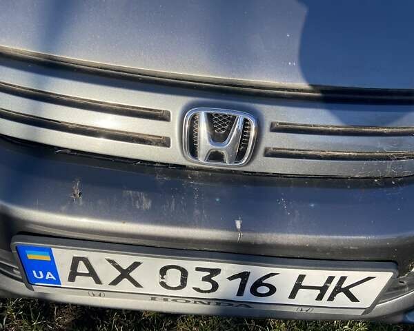 Серый Хонда Инсайт, объемом двигателя 1.34 л и пробегом 317 тыс. км за 5800 $, фото 16 на Automoto.ua