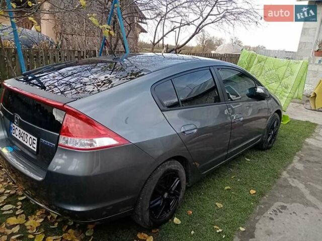 Серый Хонда Инсайт, объемом двигателя 1.34 л и пробегом 228 тыс. км за 8000 $, фото 20 на Automoto.ua