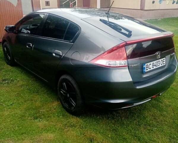 Серый Хонда Инсайт, объемом двигателя 1.34 л и пробегом 228 тыс. км за 8000 $, фото 1 на Automoto.ua