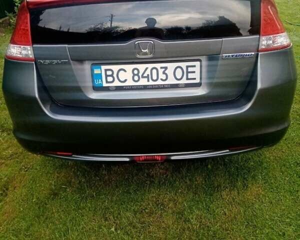 Серый Хонда Инсайт, объемом двигателя 1.34 л и пробегом 228 тыс. км за 8000 $, фото 4 на Automoto.ua