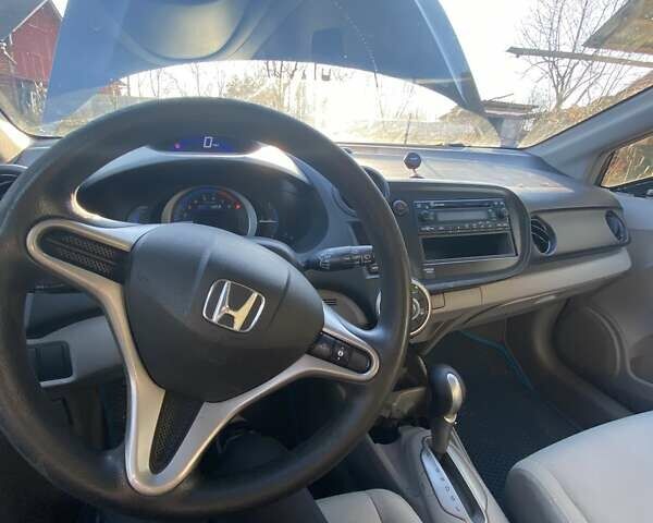 Серый Хонда Инсайт, объемом двигателя 1.34 л и пробегом 317 тыс. км за 5800 $, фото 2 на Automoto.ua