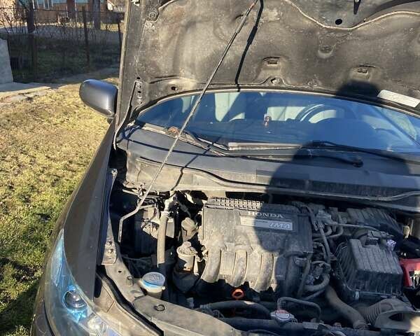 Серый Хонда Инсайт, объемом двигателя 1.34 л и пробегом 317 тыс. км за 5800 $, фото 11 на Automoto.ua