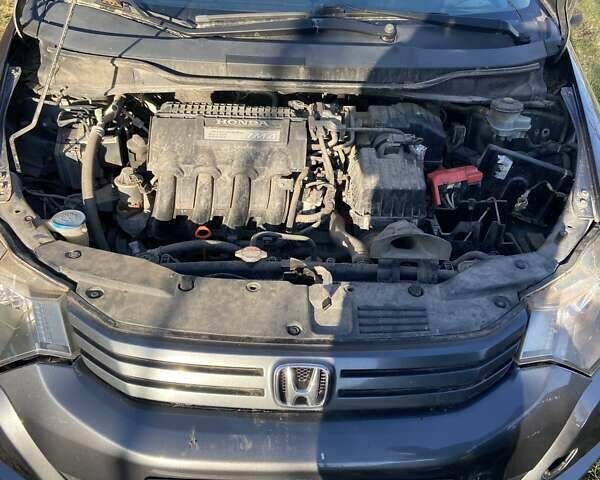 Серый Хонда Инсайт, объемом двигателя 1.34 л и пробегом 317 тыс. км за 5800 $, фото 10 на Automoto.ua
