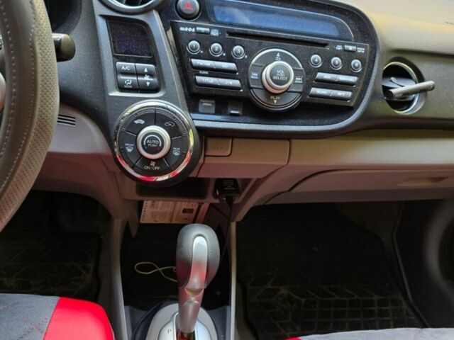Серый Хонда Инсайт, объемом двигателя 1.34 л и пробегом 175 тыс. км за 8000 $, фото 4 на Automoto.ua