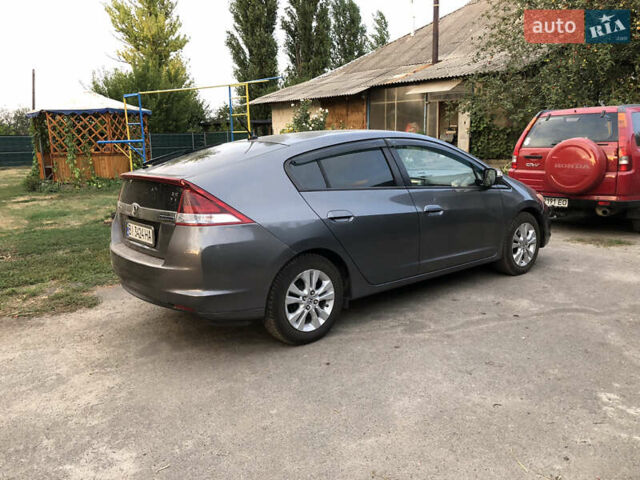 Серый Хонда Инсайт, объемом двигателя 1.34 л и пробегом 230 тыс. км за 7900 $, фото 3 на Automoto.ua