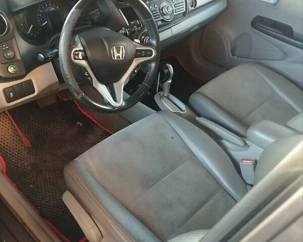 Серый Хонда Инсайт, объемом двигателя 1.3 л и пробегом 300 тыс. км за 7200 $, фото 5 на Automoto.ua