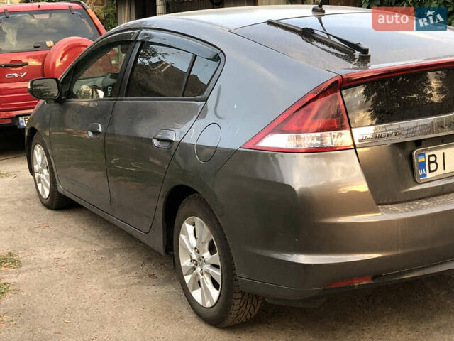 Серый Хонда Инсайт, объемом двигателя 1.34 л и пробегом 230 тыс. км за 7900 $, фото 5 на Automoto.ua