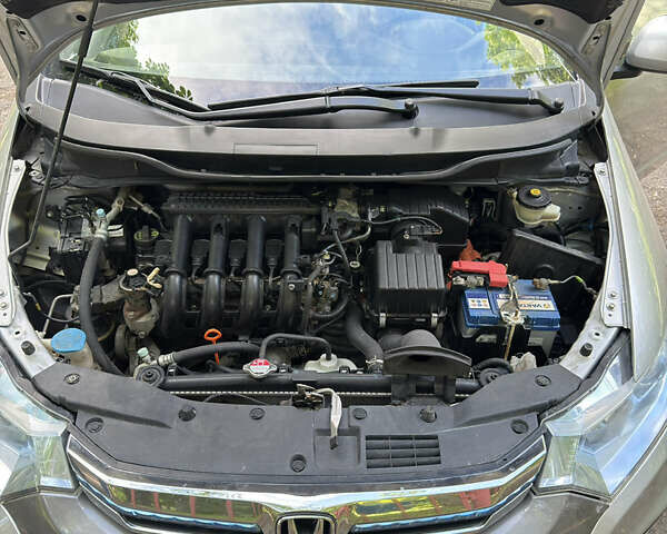 Сірий Хонда Інсайт, об'ємом двигуна 1.3 л та пробігом 300 тис. км за 6100 $, фото 25 на Automoto.ua