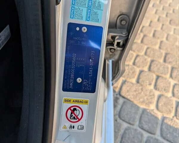 Серый Хонда Инсайт, объемом двигателя 1.3 л и пробегом 108 тыс. км за 9500 $, фото 7 на Automoto.ua