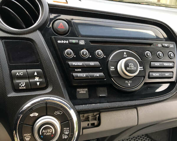 Серый Хонда Инсайт, объемом двигателя 1.34 л и пробегом 230 тыс. км за 7900 $, фото 17 на Automoto.ua