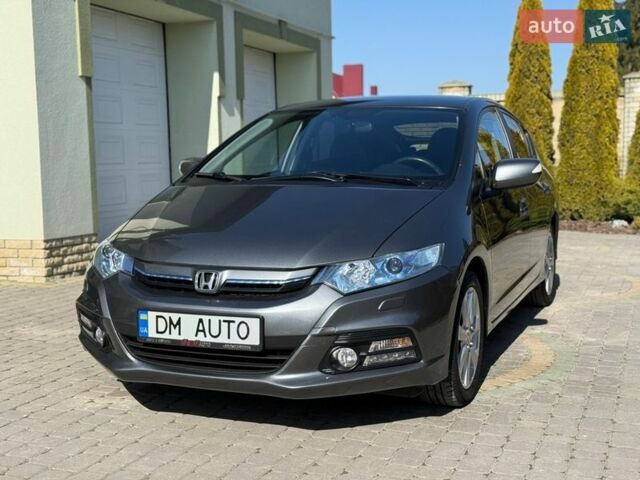 Серый Хонда Инсайт, объемом двигателя 1.3 л и пробегом 177 тыс. км за 10000 $, фото 21 на Automoto.ua