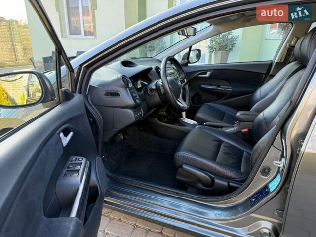 Серый Хонда Инсайт, объемом двигателя 1.3 л и пробегом 177 тыс. км за 10000 $, фото 56 на Automoto.ua