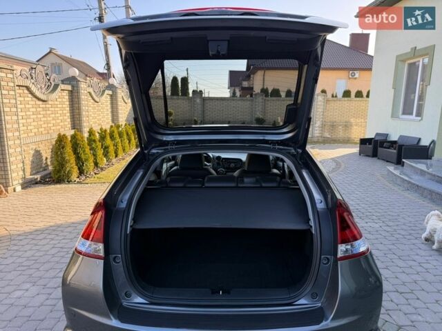 Серый Хонда Инсайт, объемом двигателя 1.3 л и пробегом 177 тыс. км за 10000 $, фото 93 на Automoto.ua