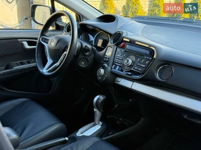 Серый Хонда Инсайт, объемом двигателя 1.3 л и пробегом 177 тыс. км за 10000 $, фото 85 на Automoto.ua