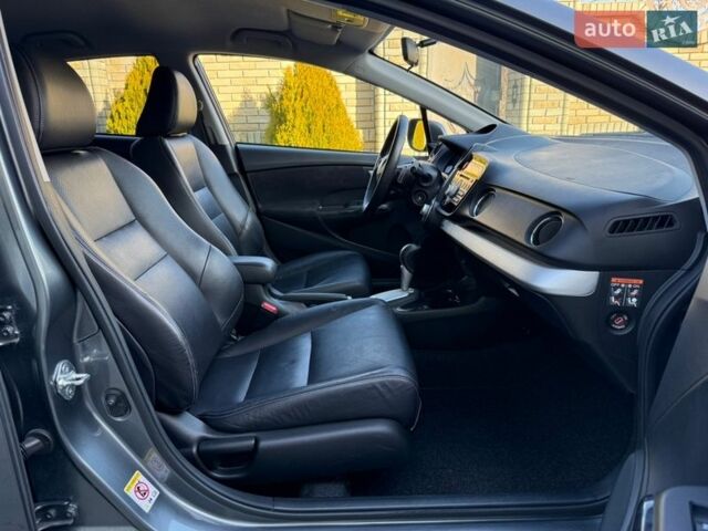 Серый Хонда Инсайт, объемом двигателя 1.3 л и пробегом 177 тыс. км за 10000 $, фото 2 на Automoto.ua