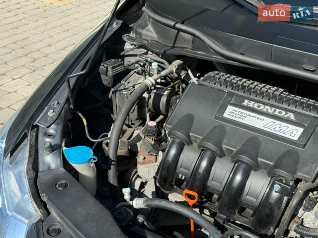 Серый Хонда Инсайт, объемом двигателя 1.3 л и пробегом 177 тыс. км за 10000 $, фото 100 на Automoto.ua