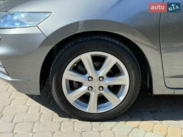 Серый Хонда Инсайт, объемом двигателя 1.3 л и пробегом 177 тыс. км за 10000 $, фото 51 на Automoto.ua