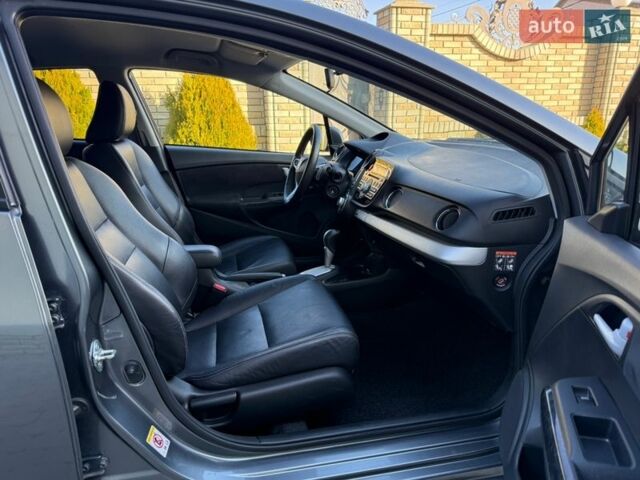 Серый Хонда Инсайт, объемом двигателя 1.3 л и пробегом 177 тыс. км за 10000 $, фото 81 на Automoto.ua