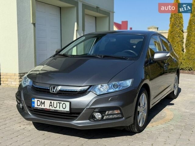 Серый Хонда Инсайт, объемом двигателя 1.3 л и пробегом 177 тыс. км за 10000 $, фото 25 на Automoto.ua